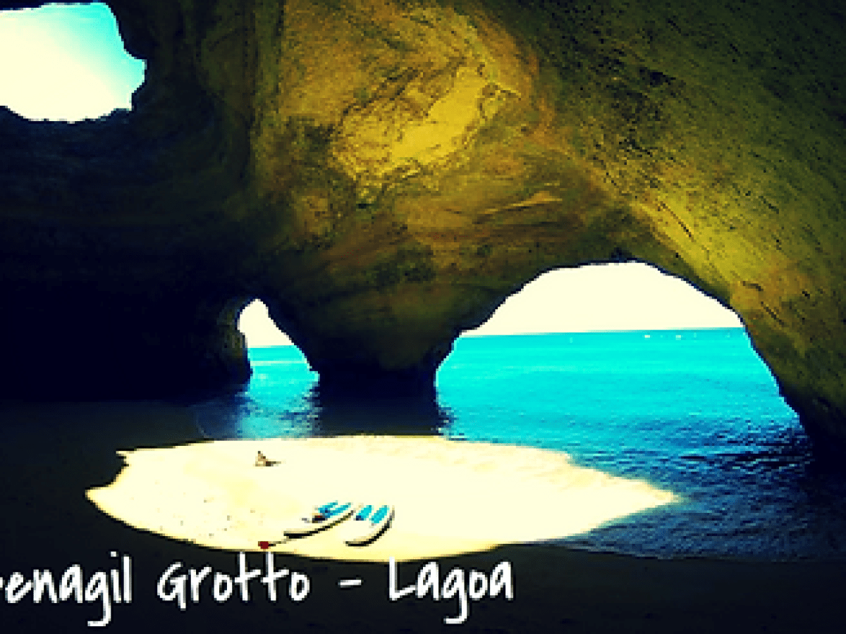 a cave next to a body of water