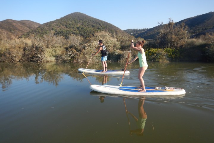 a small boat in a body of water